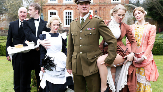This week on Downton Grabby, horny maid Loulou catches that busty MILF Rebecca Moore getting her big tits sucked on by the butler Danny D. Too curious to look away, Loulou gets caught being a voyeur, and Ms. Moore calls her in to get in on the action. Danny has the best day in his butling career as he gets to have a threesome with both those busty blonde beauties. Loulou takes his huge cock deep in her tight pussy while she eats out Rebecca, and then the slutty babes switch places so everyone gets a piece of Danny's dick. Danny even fucks Rebecca's ass, giving her an anal pounding as she eats out Loulou's tight wet pussy. Finally there's a big facial for the ladies to share, and then it's back to the intrigue at Downton Grabby!